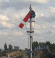 Lower-quadrant signal in the off position. (Greenford Station)
